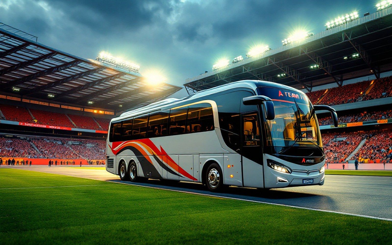 A team coach parked outside a stadium, evening